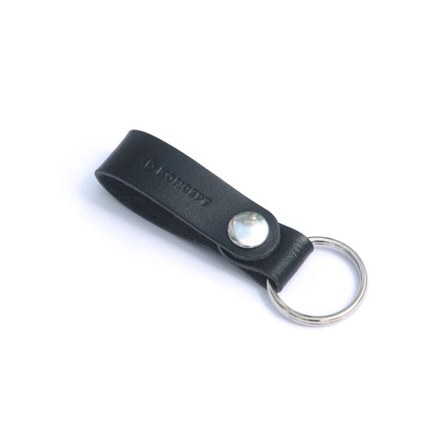 Black leather key ring by Koncept Studios with metal ring and snap button