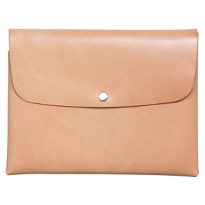 Front view of natural leather pouch bag by Koncept Studios with a secure snap button