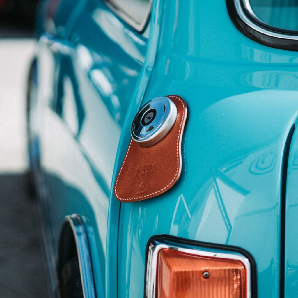 Koncept Studios fuel bib on blue classic mini