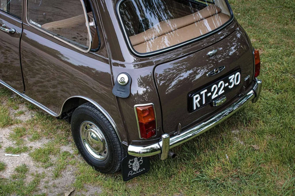 Koncept Studios personalized fuel bib installed on a brown classic Mini